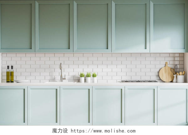 时尚厨房的内部有白色的砖墙蓝色的橱柜和台面内置水槽和炊具